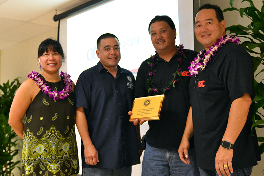 Group photo with award