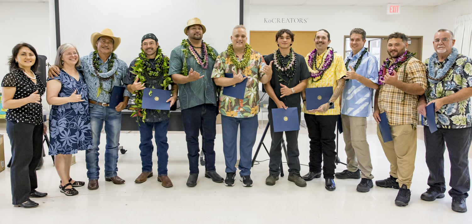 The inaugural class of Hawai‘i Community College’s butchery course with instructor Bill Wong (third from left) and Wade Cypriano (far right), Hawaii CC Chancellor Susan Kazama (far left), Hawaii CC VCAA Kimberley Collins (second from left), and Mayor Kimo Alameda (center). (Photo Credit: Sarah Anderson)