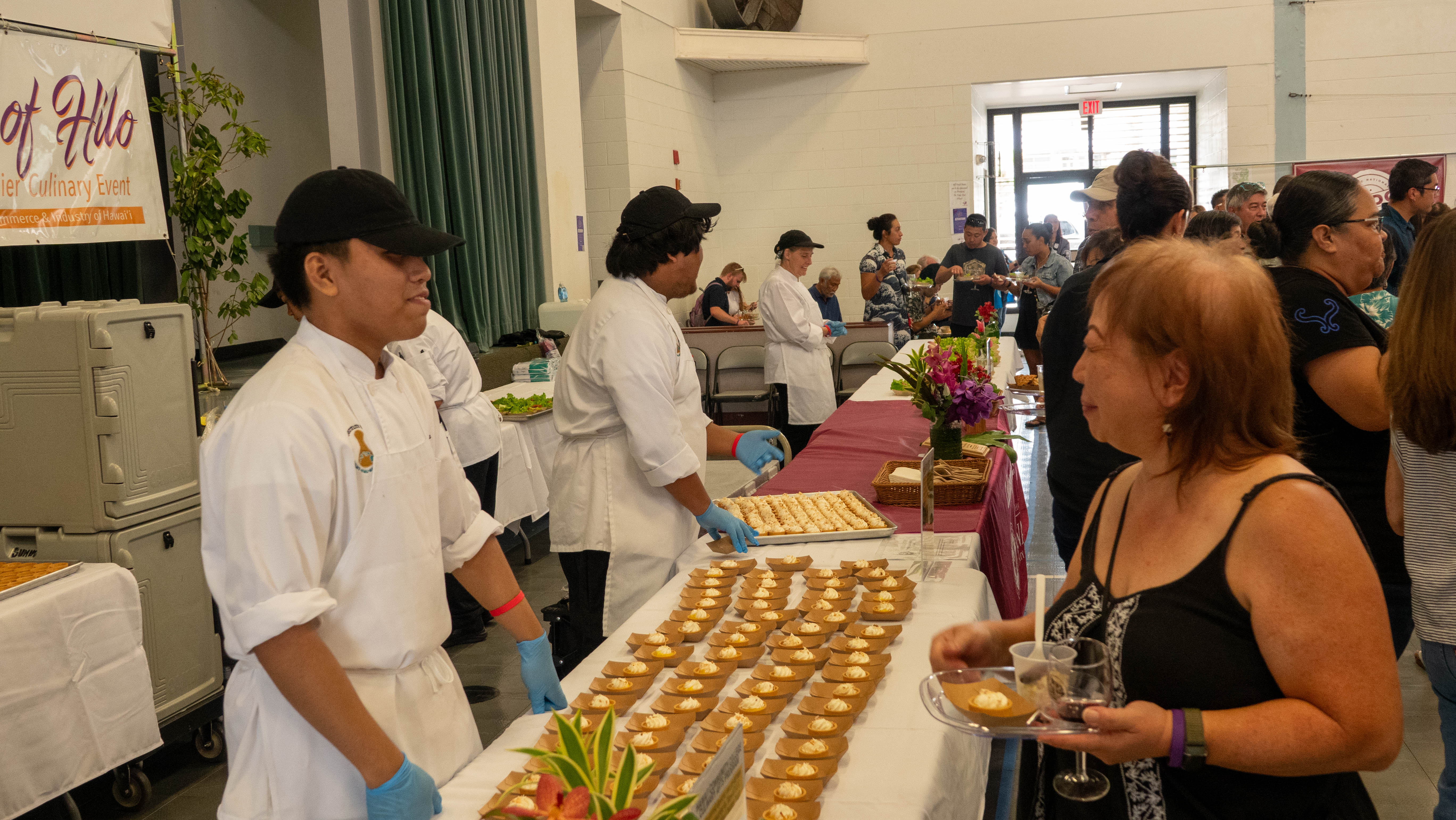 The Featured Chef table offered liliko'i tarts by Hawai'i CC's chef Tori Hiro, . Hiro, culinary program lecturer and lab manager at Hawai'i CC, chose to utilize liliko'i grown by the college's agriculture program, demonstrating the true farm-to-table partnership between the two programs. 