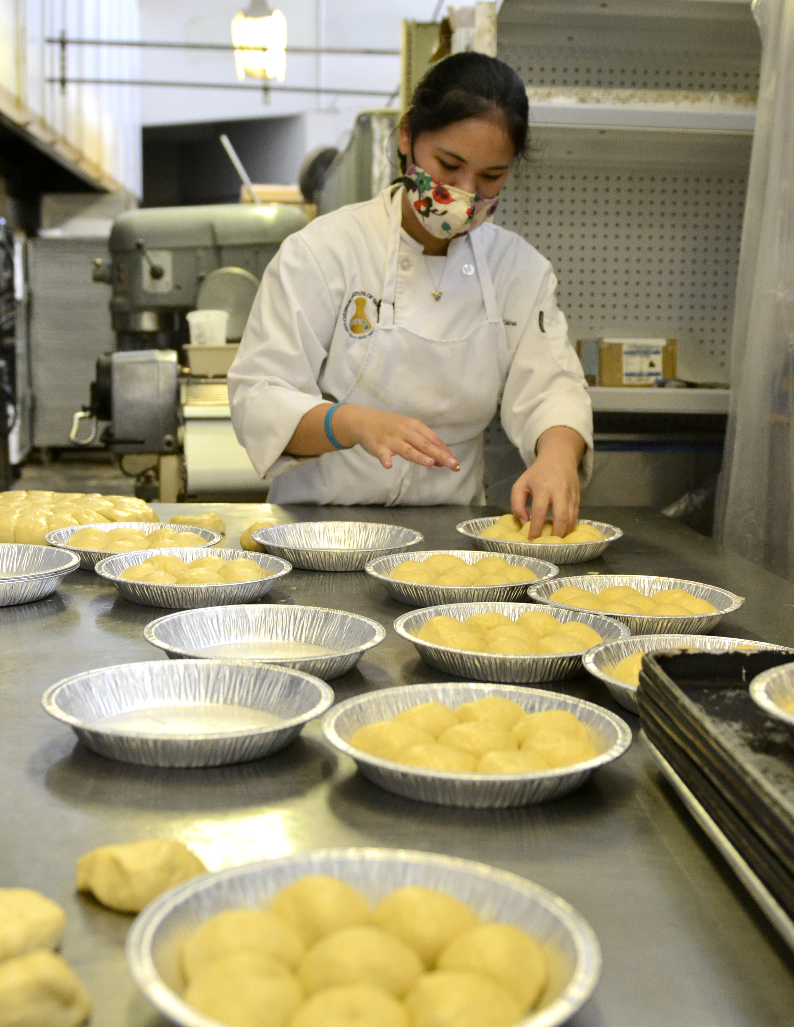 Hawai‘i Community College Culinary Arts student Jaylin Pa’a’aina makes rolls at Short N Sweet Bakery in Hilo where she’s learning patisserie. 