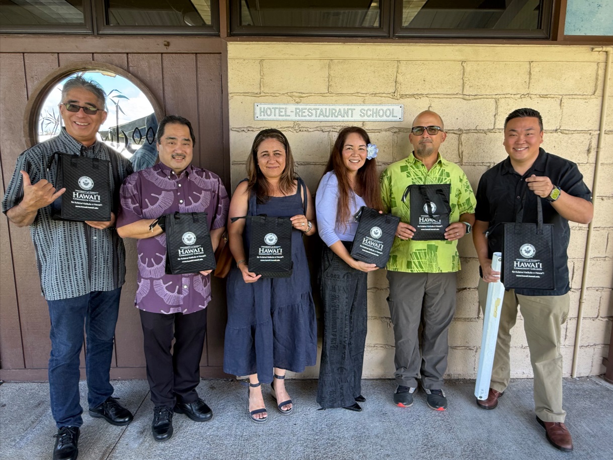 JCCIH president Ka‘iu Kimura (third from left) was joined by other chamber members at the check presentation lunch at Bamboo Hale.