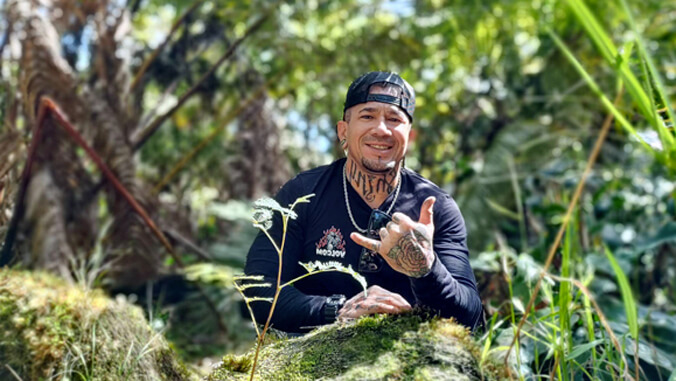 Drew Camacho working on restoring ancient Hawaiian trails in the Pālamanui Dryland Forest Reserve