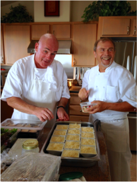 Chef posing with desserts