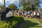 Traditional Kīpaepae (welcoming ceremony) in front of the campus sign at the entrance of the college.