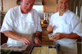 Chef posing with desserts
