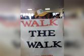 walk the walk sign